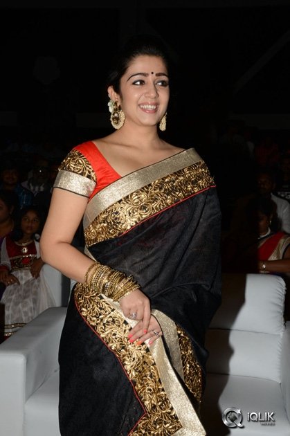 Charmi-at-Jyothi-Lakshmi-Movie-Audio-Launch